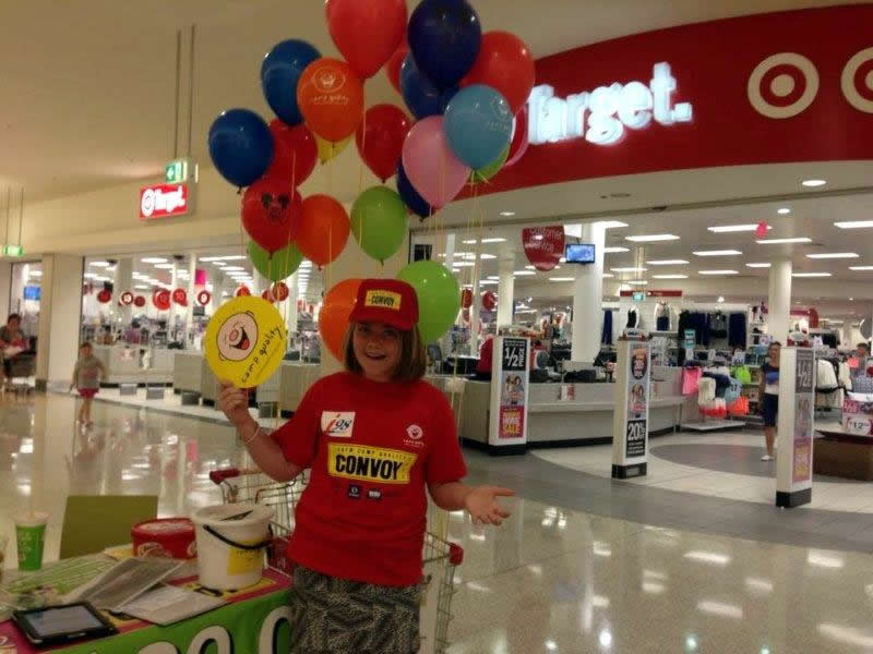 2013 happy volunteer at shopping centre